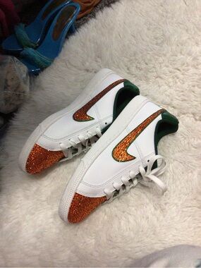 Nike White Sneakers with Orange Glitter Toe and Green Accents